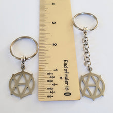 Load image into Gallery viewer, Vegan Anarchism Keychain, Backpack or Purse Charm, Zipper Pull, Stainless Steel Charm, Vegetarian Anarchist Key Ring