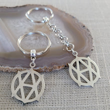 Load image into Gallery viewer, Vegan Anarchism Keychain, Backpack or Purse Charm, Zipper Pull, Stainless Steel Charm, Vegetarian Anarchist Key Ring