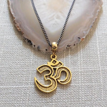 Load image into Gallery viewer, Ohm Aum Necklace - Brass Charm on Gunmetal Curb Chain - Reiki Zen Yoga Jewelry
