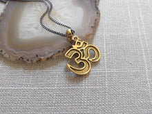 Load image into Gallery viewer, Ohm Aum Necklace - Brass Charm on Gunmetal Curb Chain - Reiki Zen Yoga Jewelry