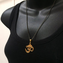 Load image into Gallery viewer, Ohm Aum Necklace - Brass Charm on Gunmetal Rolo Chain - Reiki Zen Yoga Jewelry