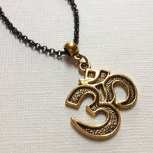 Load image into Gallery viewer, Ohm Aum Necklace - Brass Charm on Gunmetal Rolo Chain - Reiki Zen Yoga Jewelry
