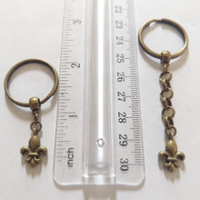 Load image into Gallery viewer, Tiny Bronze Fleur de Lis Keychain Key Ring or Zipper Pull
